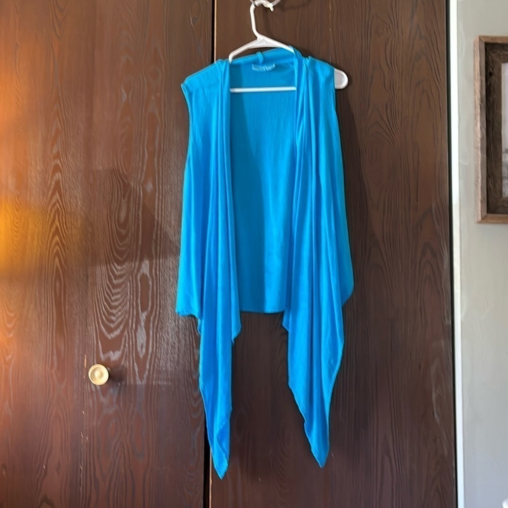 Indian Tropical turquoise, asymmetrical vest. Size one size.